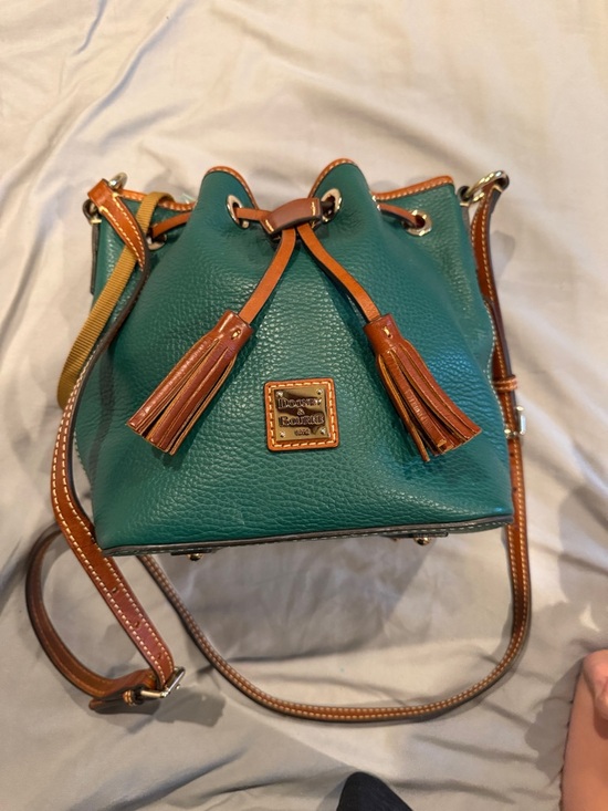 Dooney & Bourke Handbags - Dooney & Bourke Green Leather Drawstring Tassel Crossbody with Brown Trim